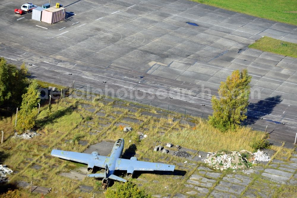 Peenemünde from above - View of an old plane wreck on the area of the Peenemuende Airfield in the state Mecklenburg-Vorpommern