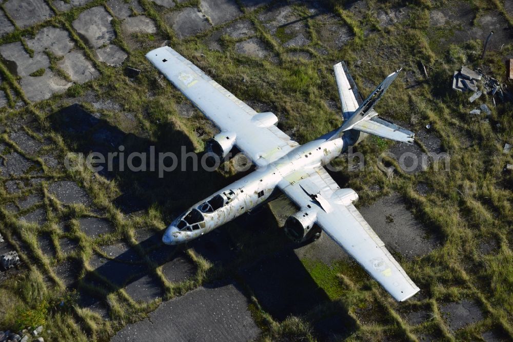 Aerial photograph Peenemünde - View of an old plane wreck on the area of the Peenemuende Airfield in the state Mecklenburg-Vorpommern