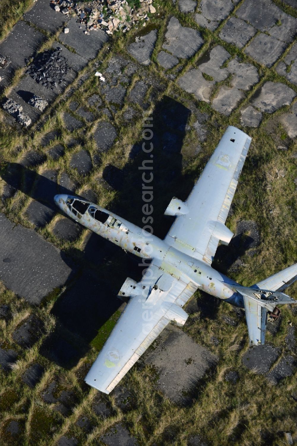 Peenemünde from above - View of an old plane wreck on the area of the Peenemuende Airfield in the state Mecklenburg-Vorpommern