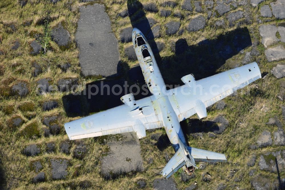 Peenemünde from the bird's eye view: View of an old plane wreck on the area of the Peenemuende Airfield in the state Mecklenburg-Vorpommern