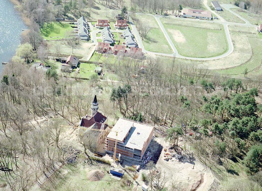 Aerial photograph Wendisch-Rietz / Brandenburg - Altes Landschloß unmittelbar gegenüber des Golfplatzes am Scharmützelsee in Wendisch-Riez. Tourismusverein Scharmützelsee e.V. Geschäftsstelle: im Haus des Gastes Kleine Promenade 1, 15864 Wendisch Rietz, Tel.: 03 36 79 - 64 84-0, Fax: 03 36 79 - 64 84 30 tourismus@scharmuetzelsee.de Kur- und Fremdenverkehrsgesellschaft mbH Am Kurpark 1 15526 Bad Saarow Telefon: 033631/868 - 0 Telefax: 033631/868 - 120 eMail: info@bad-saarow.de Scharmützelsee Amtsdirektor: Carsten Krappmann Forsthausstraße 4 15524 Bad Saarow-Pieskow Tel.: 033631 / 45-141 Fax: 033631 / 45-101 poststelle@amt-scharmuetzelsee.de