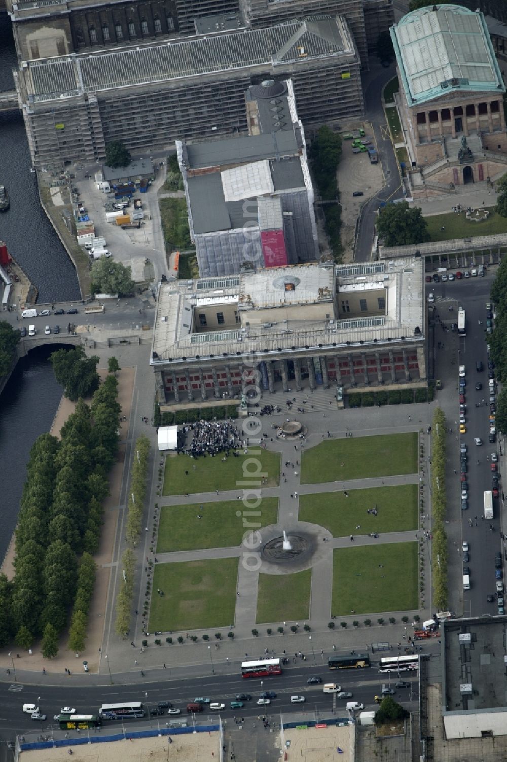 Berlin from the bird's eye view: With its striking staircase and the portico the Altes Museum is the defining building in the Lustgarten in Berlin in the state of Berlin. The Lust garden is a garden on the Museum Island Berlin. It was created from designs by Peter Joseph Lenne. The Old Museum presents the antique collection of the National Museums of Berlin. Architect of the important monument in the style of classicism is Karl-Friedrich Schinkel. In the background are the Old National Gallery , the New Museum, Pergamon Museum to see. The Museum Island is a UNESCO World Heritage Site