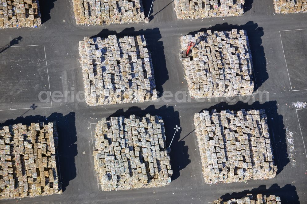 Eisenhüttenstadt from the bird's eye view: View at Waste paper stacks on the plant grounds of the factory for corrugated base paper Propapier plant PM2 GmbH in Eisenhüttenstadt in Brandenburg