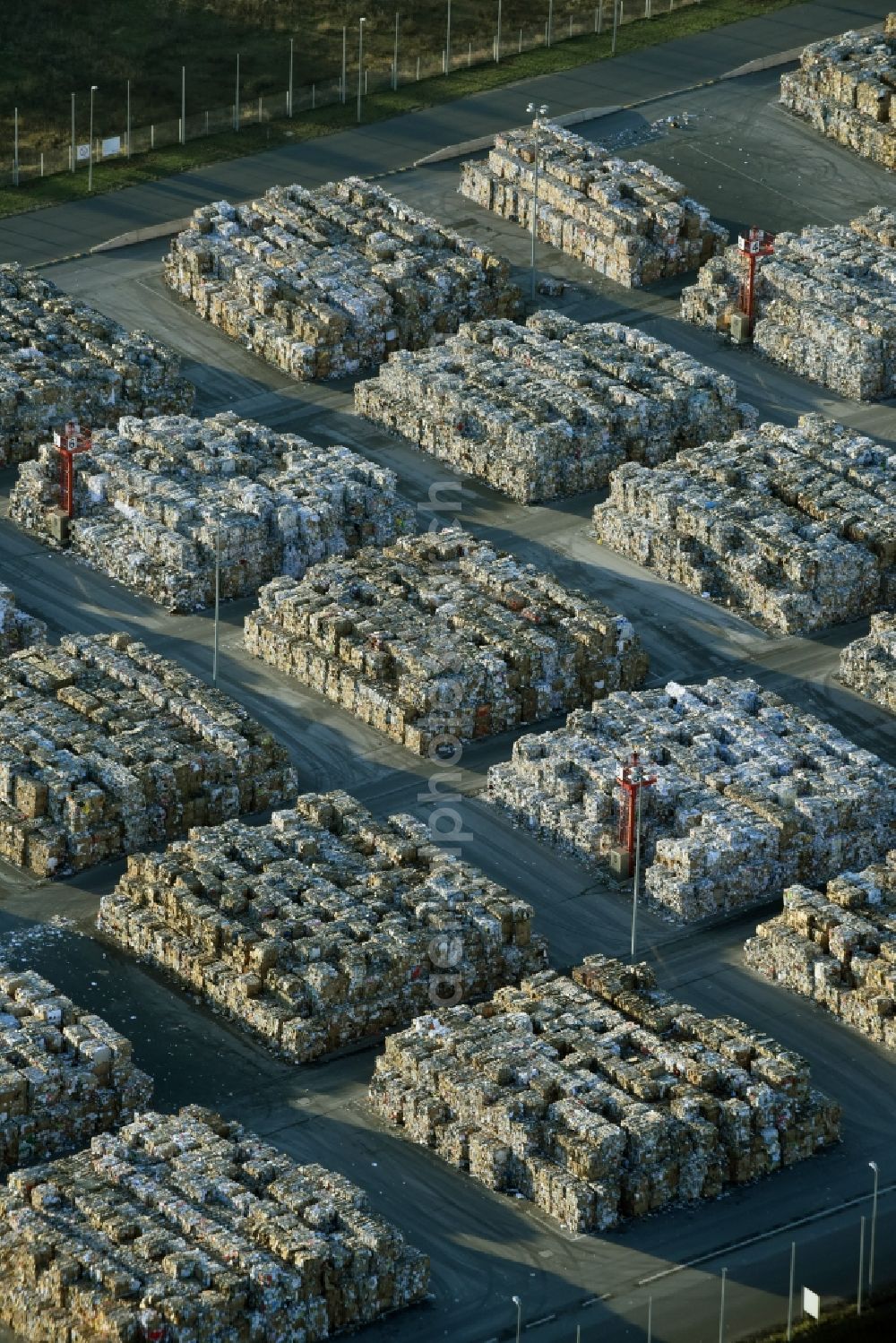 Aerial image Eisenhüttenstadt - View at Waste paper stacks on the plant grounds of the factory for corrugated base paper Propapier plant PM2 GmbH in Eisenhuettenstadt in Brandenburg