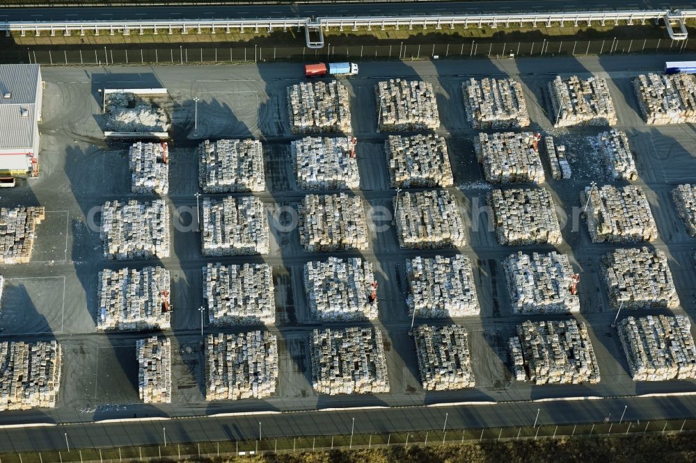 Eisenhüttenstadt from the bird's eye view: View at Waste paper stacks on the plant grounds of the factory for corrugated base paper Propapier plant PM2 GmbH in Eisenhuettenstadt in Brandenburg