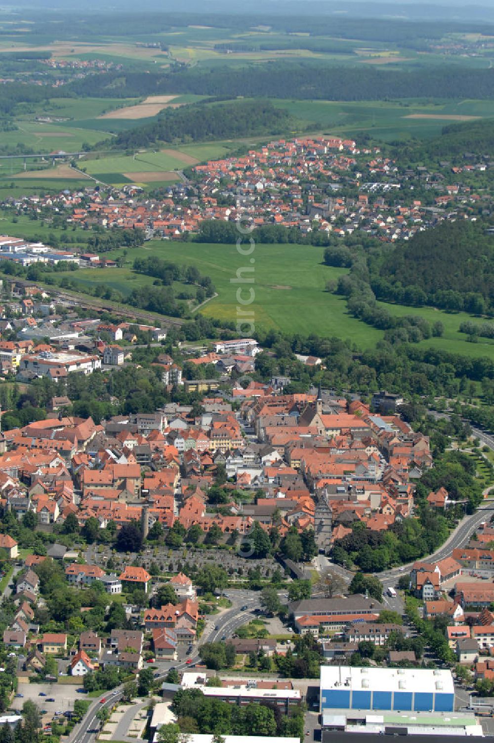 Bad Neustadt from above - Cityscape with the Assumption of Mary Church in the old town of Bad Neustadt in Bavaria