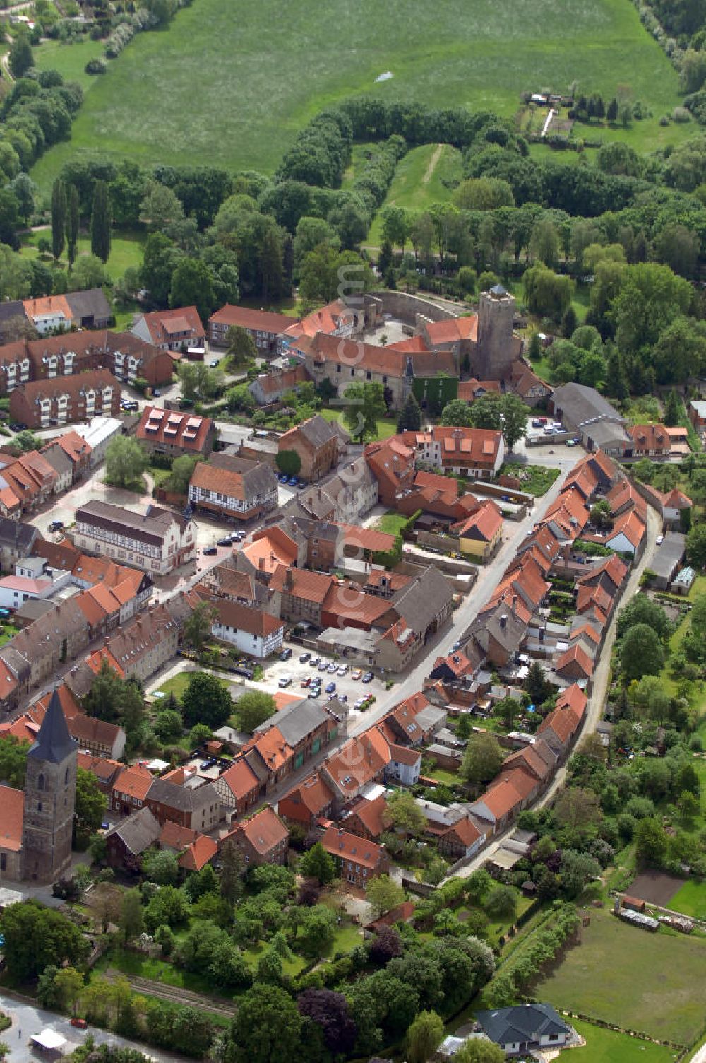 Oebisfelde from above - Old town with the castle and the Saint Catherine ' s Church of Oebisfelde in Saxony-Anhalt