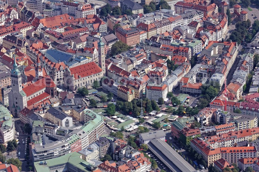 München from the bird's eye view: Old town center around the Viktualienmarkt in Munich in the state of Bavaria. The food market is surrounded by the Schrannenhalle and the churches Alter Peter and Heilig Geist