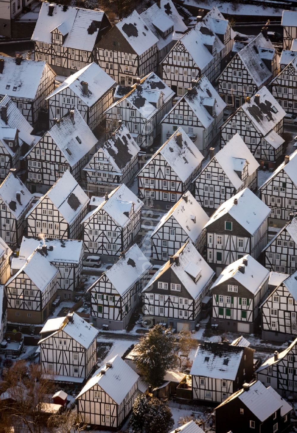 Aerial image Freudenberg - Wintry snowy old Town area and downtown center with half-timbered houses Alter Flecken on the street Krottorfer in Freudenberg in North Rhine-Westphalia