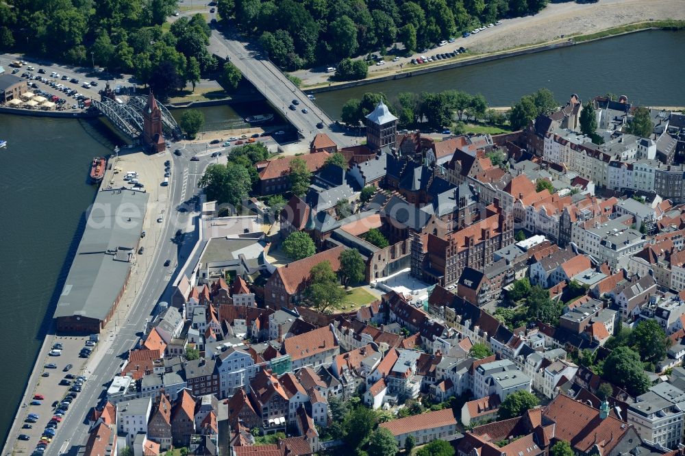 Lübeck from the bird's eye view: Old Town area and city center in Luebeck with the tower of the Burgtor in the state Schleswig-Holstein