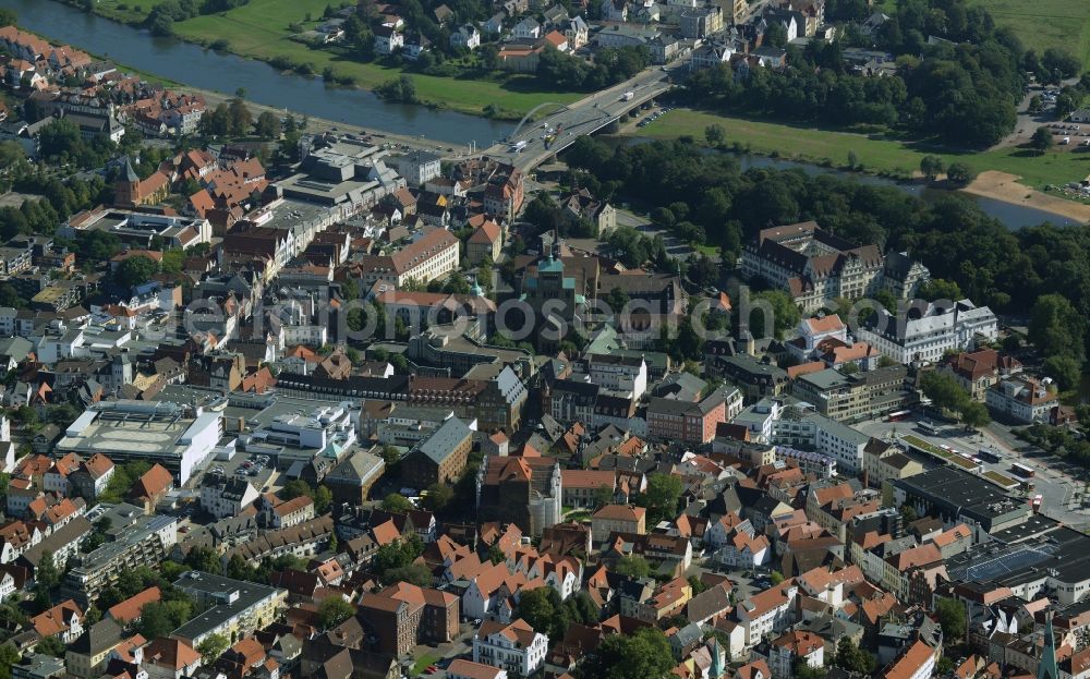 Minden from above - Historic town centre of Minden in the state of North Rhine-Westphalia. The town centre is located on the riverbank of the river Weser. It includes historic residential buildings, shopping facilities and churches such as Minden Cathedral