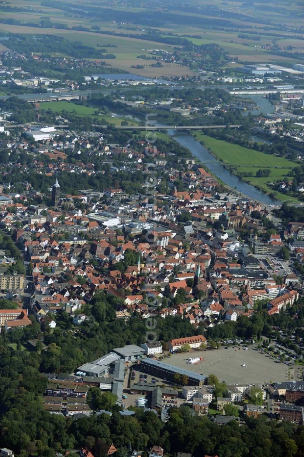 Minden from above - Historic town centre of Minden in the state of North Rhine-Westphalia. The town centre is located on the riverbank of the river Weser. It includes historic residential buildings, shopping facilities and churches such as Minden Cathedral