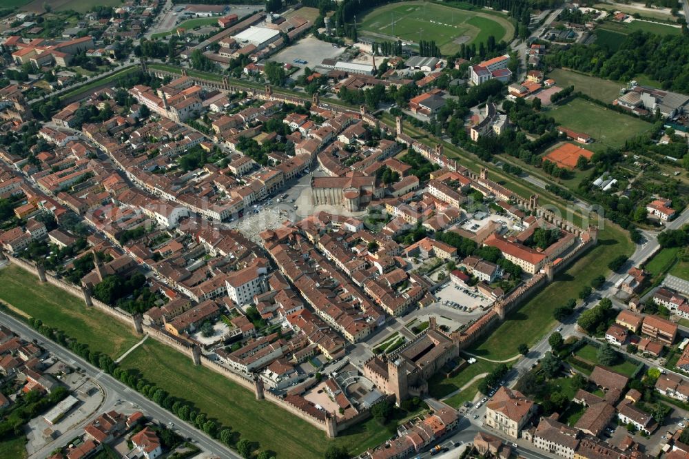 Aerial image Montagnana - Old Town area and city center in Montagnana in Venetien, Italy. The city is surrounded by a medieval city wall with numerous towers. It belongs to the unification of the most beautiful places in Italy. On the lower right, outside the wall, the Villa Pisani, one of the masterpieces of Andrea Palladio