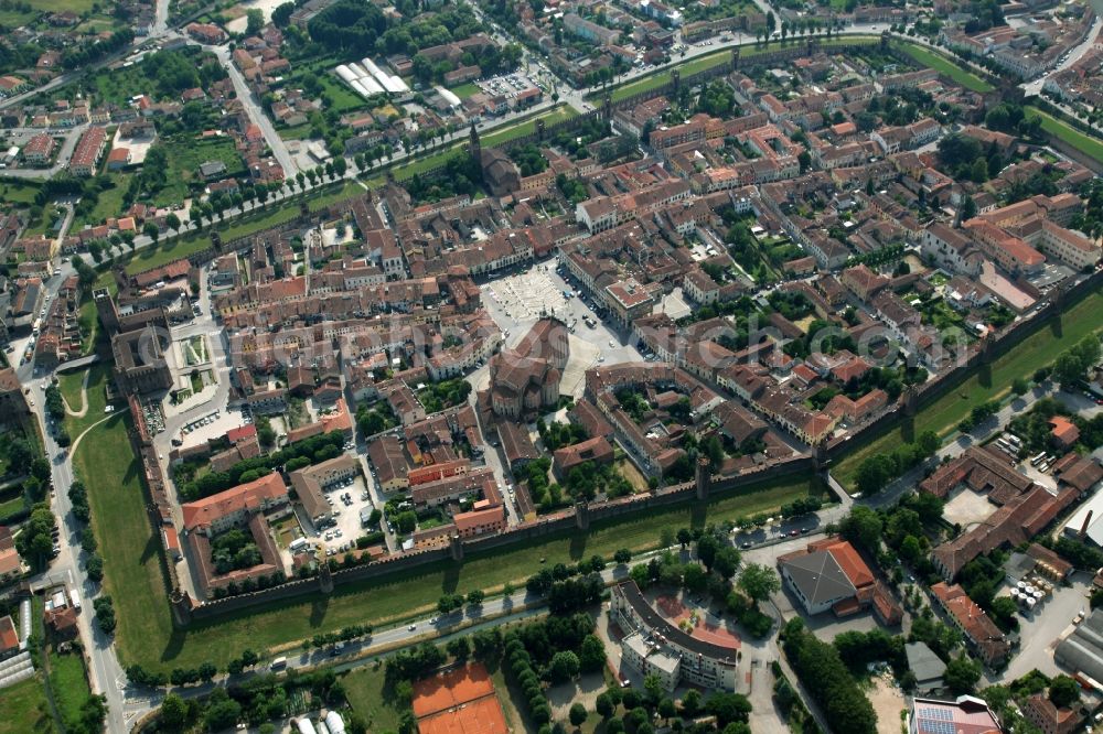 Montagnana from the bird's eye view: Old Town area and city center in Montagnana in Venetien, Italy. The city is surrounded by a medieval city wall with numerous towers. It belongs to the unification of the most beautiful places in Italy