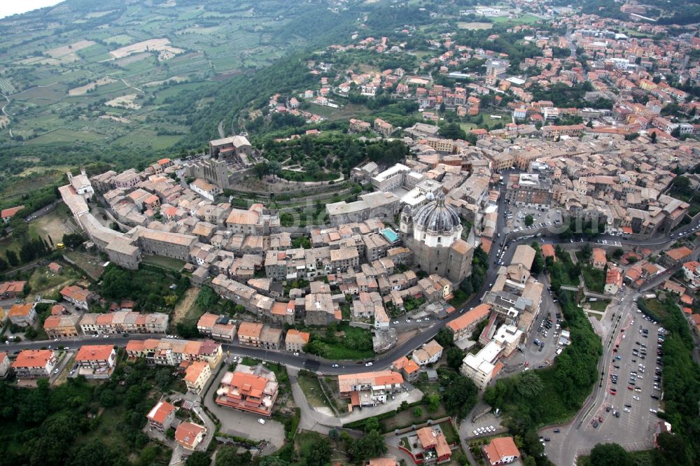 Montefiascone from above - Old Town area and downtown center in Montefiascone in Lazio in Italy. The community is located in the Monti Volsini volcanically formed on the southeast shore of Lake Bolsena and is crowned by the ruins of the Papal Palace and the Cathedral of Sancta Margherita, built starting in 1519 by Pope Urban V. from the architects Michele Sanmicheli and Carlo Fontana