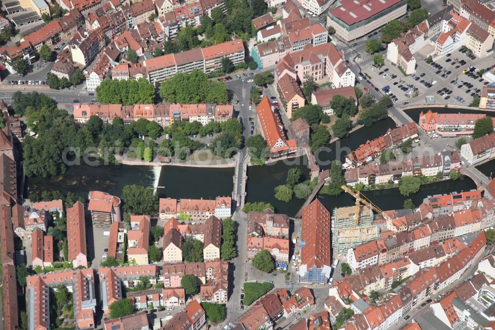 Nürnberg from above - Old Town area and city center in Nuremberg in the state Bavaria. In the picture the Kettensteg, the Maxbruecke and the Henkersteg leading over the river Pegnitz