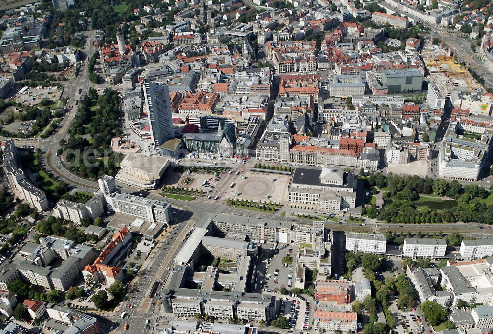 Aerial image Leipzig - Baustelle vom Neubau des Hauptgebäudes der UNI Leipzig, 4.BA am Hochhaus des MDR am Augustusplatz in 04275 Leipzig. Es entsteht ein Neubau der Aula als multifunktionales und repräsentatives Herzstück im entstehnden Campus der Universität Leipzig am Augustusplatz neben dem Hohlen Zahn, dem MDR- Hochhaus. Construction onto the main building of the University of Leipzig.