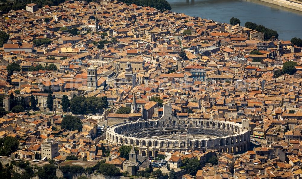 Aerial image Arles - Amphi theater in the city center of Arles on the Cote d'Azur in France