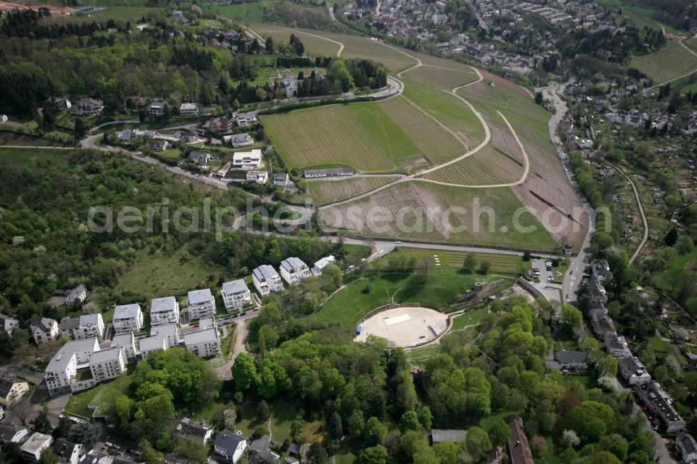 Trier from the bird's eye view: The amphitheater from the Roman period with landscape and adjacent residential area on the Bergstrasse in Trier in Rhineland-Palatinate