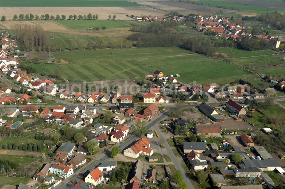 Aerial photograph Angern - Blick auf die Chausseestrasse Ecke Friedensstrasse in Angern nordöstlich von Wolmirstedt. Angern liegt in Sachsen-Anhalt, Ohrekreis und hat 1300 Einwohner. Erste schriftliche Erwähnungen des Ortes gehen bis in das 14. Jahrhundert zurück. Kontakt: Verbandsverwaltung Elbe-Heide, Magdeburger Strasse 40, 39326 Rogätz, Tel. +49(0)39208 274 0, Fax +49(0)39208 274 32, E-Mail: info@elbe-heide.de