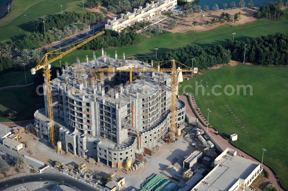 Ras Al Khaimah from the bird's eye view: Complex and construction site of the Al Hamra Fort Hotel & Beach Resort in the arab emirate Ras Al Khaimah. The complex is part of the construction project Al Hamra Village which is realized by the state-owned company Al Hamra Real Estate