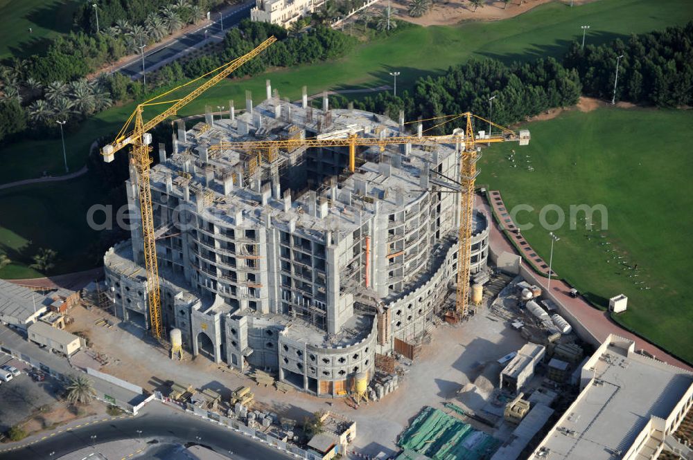 Aerial image Ras Al Khaimah - Complex and construction site of the Al Hamra Fort Hotel & Beach Resort in the arab emirate Ras Al Khaimah. The complex is part of the construction project Al Hamra Village which is realized by the state-owned company Al Hamra Real Estate