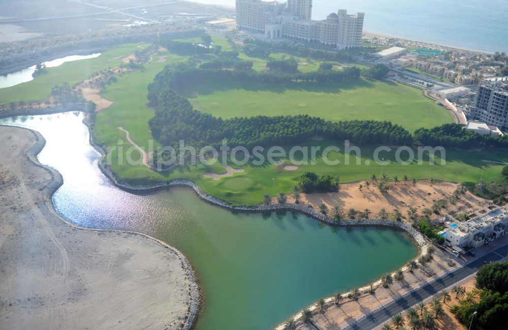 Aerial image Ras Al Khaimah - Complex of the Al Hamra Golf Club in the arab emirate Ras Al Khaimah. The golf club is part of the Al Hamra Village Project, the second largest construction project of Ras Al Khaimah. The project is realized by the state-owned company Al Hamra Real Estate