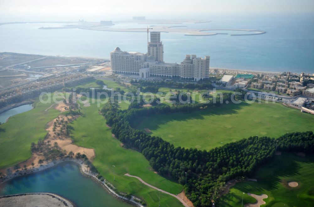 Ras Al Khaimah from above - Complex of the Al Hamra Golf Club in the arab emirate Ras Al Khaimah. The golf club is part of the Al Hamra Village Project, the second largest construction project of Ras Al Khaimah. The project is realized by the state-owned company Al Hamra Real Estate