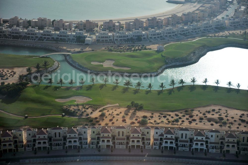 Ras Al Khaimah from the bird's eye view: Complex of the Al Hamra Golf Club in the arab emirate Ras Al Khaimah. The golf club is part of the Al Hamra Village Project, the second largest construction project of Ras Al Khaimah. The project is realized by the state-owned company Al Hamra Real Estate