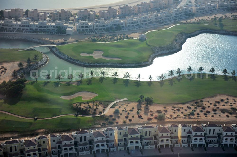 Aerial image Ras Al Khaimah - Complex of the Al Hamra Golf Club in the arab emirate Ras Al Khaimah. The golf club is part of the Al Hamra Village Project, the second largest construction project of Ras Al Khaimah. The project is realized by the state-owned company Al Hamra Real Estate