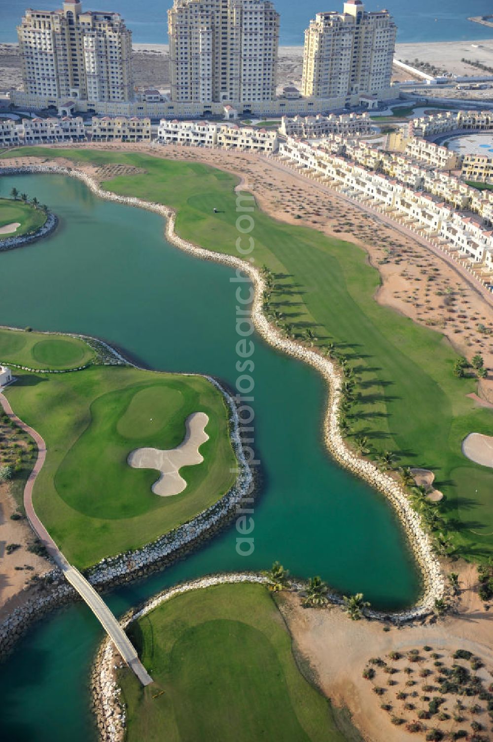 Ras Al Khaimah from the bird's eye view: Complex of the Al Hamra Golf Club in the arab emirate Ras Al Khaimah. The golf club is part of the Al Hamra Village Project, the second largest construction project of Ras Al Khaimah. The project is realized by the state-owned company Al Hamra Real Estate