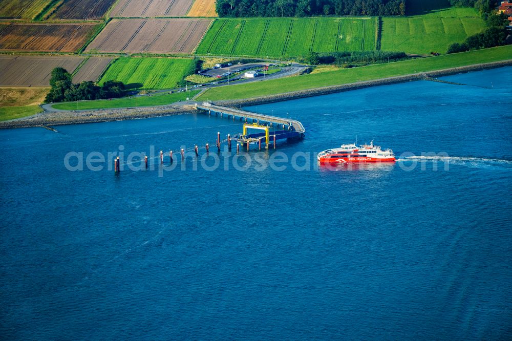 Aerial image Brunsbüttel - Docking ferry ship Halunder Jet at the Elbe pier in Brunsbuettel in the state Schleswig-Holstein, Germany