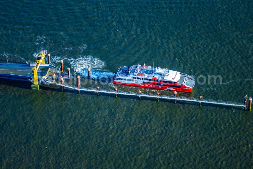 Aerial photograph Brunsbüttel - Docking ferry ship Halunder Jet at the Elbe pier in Brunsbuettel in the state Schleswig-Holstein, Germany