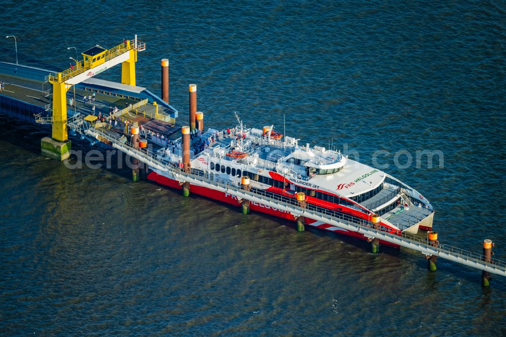 Aerial photograph Brunsbüttel - Docking ferry ship Halunder Jet at the Elbe pier in Brunsbuettel in the state Schleswig-Holstein, Germany