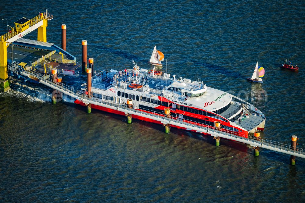 Aerial photograph Brunsbüttel - Docking ferry ship Halunder Jet at the Elbe pier in Brunsbuettel in the state Schleswig-Holstein, Germany