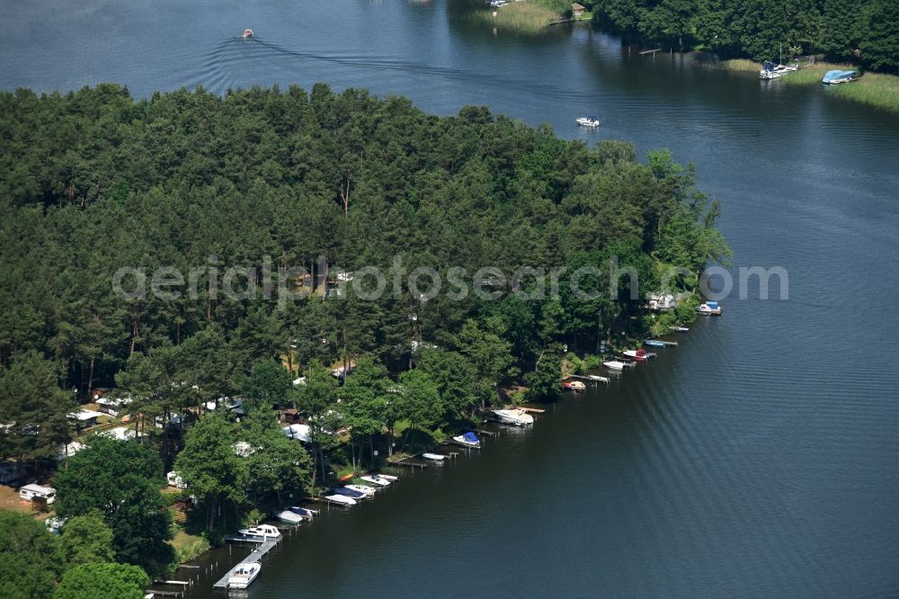 Zechlinerhütte from above - Boat marina with docks and moorings on the shore of Lake Schlabornsee in Zechlinerhuette in the state of Brandenburg