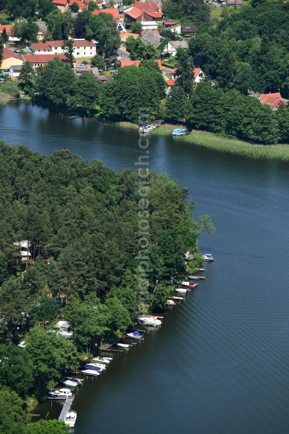 Aerial image Zechlinerhütte - Boat marina with docks and moorings on the shore of Lake Schlabornsee in Zechlinerhuette in the state of Brandenburg