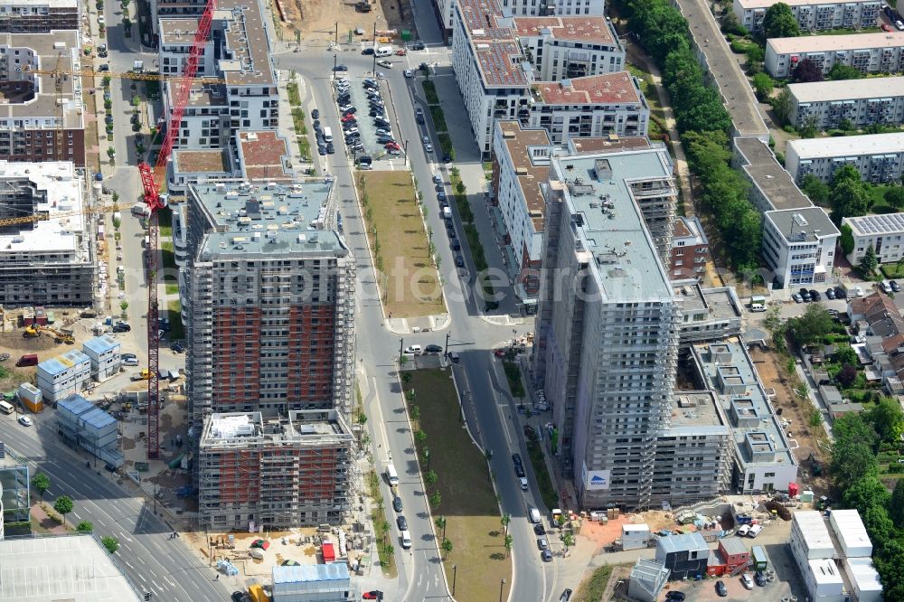 Frankfurt am Main from the bird's eye view: View of the Europaviertel quarter in the Gallus part of Frankfurt in the state of Hesse. The quarter is a new downtown district on site of the former main freight yard in the Gallus part of the town. It was started in 2005 and the first high rise was opened in 2006. It will be completed in 2019 and include office buildings, hotels, appartment buildings, a school and social infrastructure such as parks and shopping facilities. Westside Tower is being built on the Western entrance of the quarter