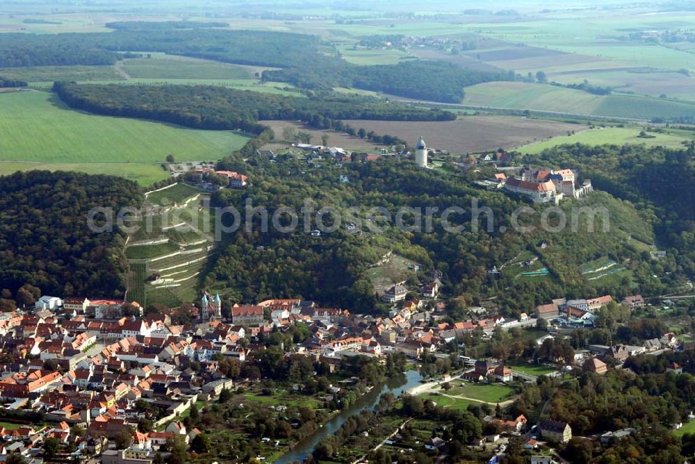 Aerial photograph Freyburg/Unstrut - Blick auf das Winzerstädtchen Freyburg/Unstrut, aus der der Rotkäppchen-Sekt stammt. Im Hintergrund ist die Neuenburg zu sehen, mit deren Bau die Geschichte der Stadt begann. Seit 1999 ist Freyburg ein staatlich anerkannter Erholungsort und darf sich zudem Jahn- und Weinstadt nennen, da der Turnvater (Friedrich Ludwig) Jahn hier gestorben ist.