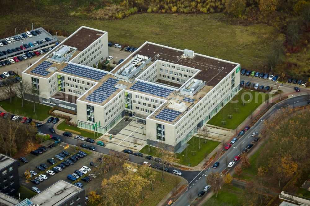 Dortmund from above - AOK NordWest building in the Schueren-Neu part of Dortmund in the state of North Rhine-Westphalia. The building of the health insurance company was opened in 2012 after plans by Nattler Architects Essen and includes several photovoltaic solar cells on its roof. The building is located on Kopenhagener Strasse