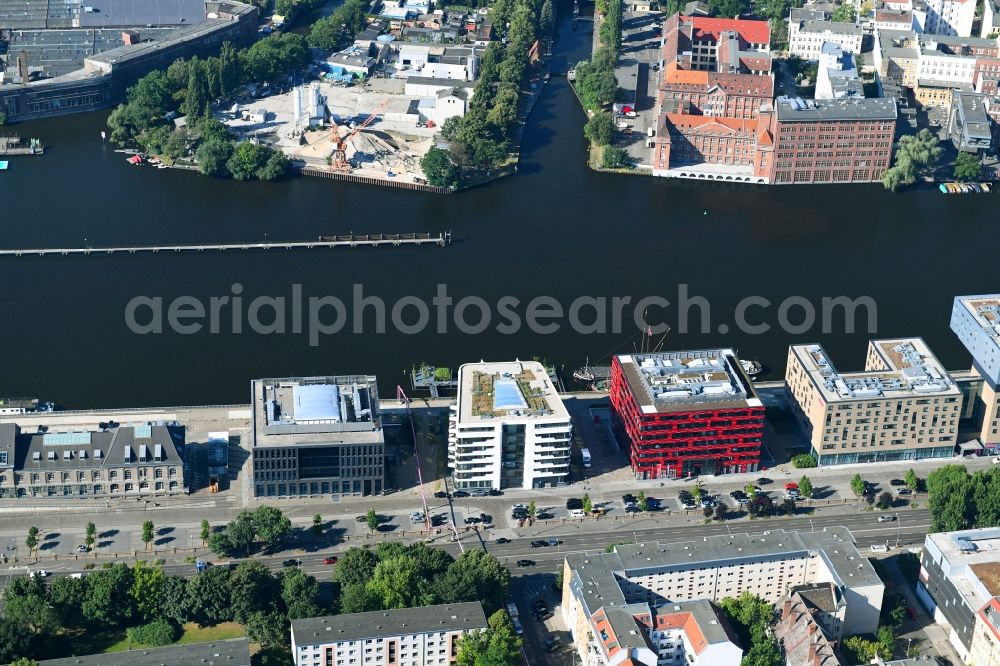 Berlin from above - Construction site of the new multi-family residential and apartment building complex The White on East harbour on the Northern shore of the Spree in Berlin in Germany