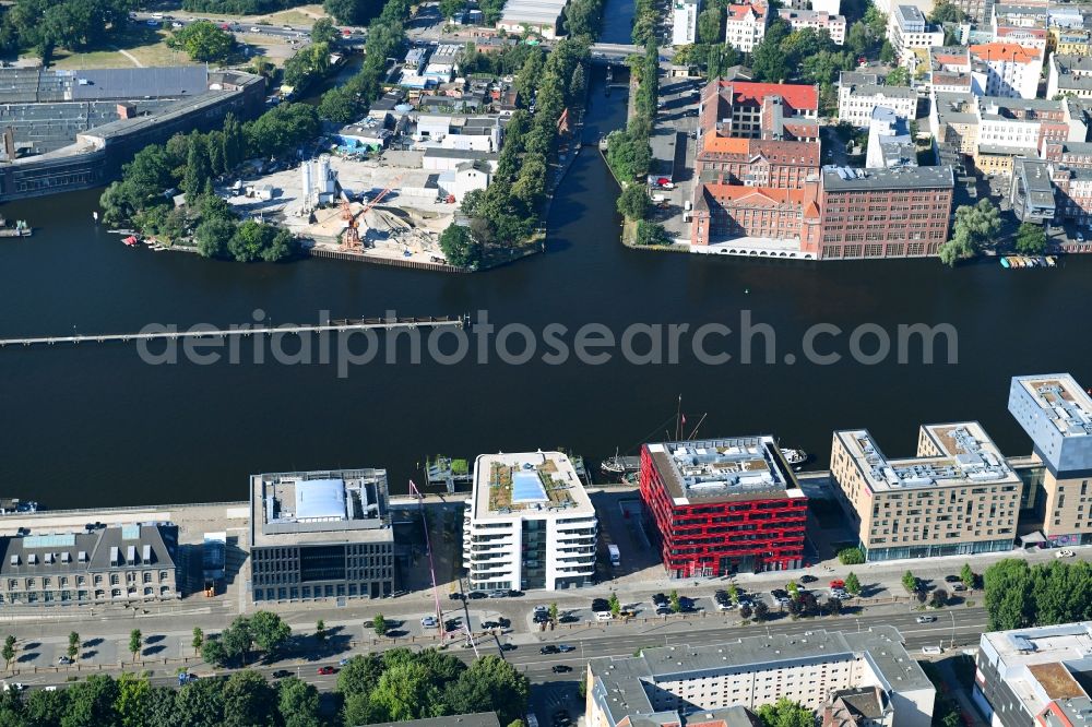 Berlin from the bird's eye view: Construction site of the new multi-family residential and apartment building complex The White on East harbour on the Northern shore of the Spree in Berlin in Germany