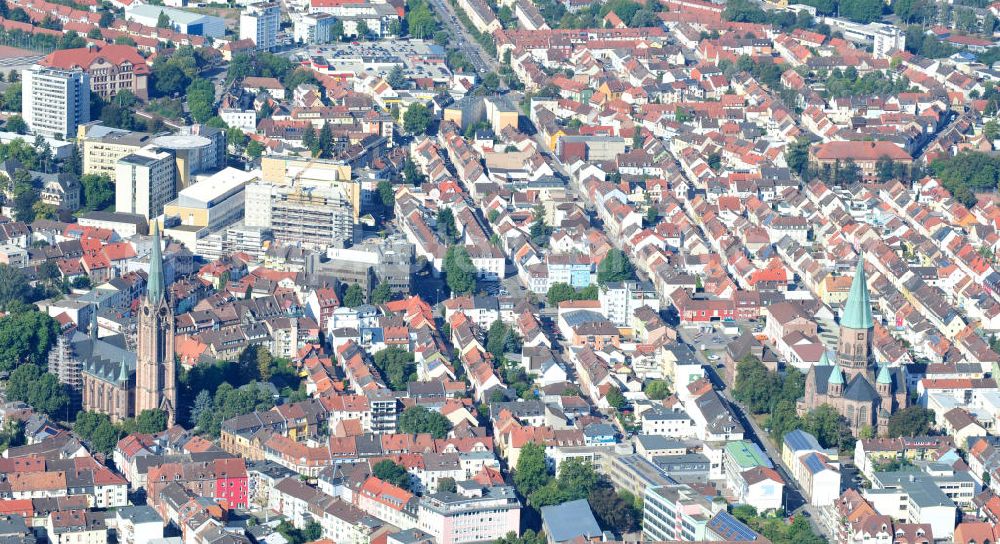 Kaiserslautern from above - Blick über die Innenstadt von Kaiserslautern in Rheinland-Pfalz, geprägt durch die Marienkirche und die Apostelkirche, sowie durch Wohnhäuser und Geschäftsgebäude. View over inner city of Kaiserslautern in Rhineland-Palatinate, characterized by church St. Maria and Church of the Apostles, as well as by tenements and business buildings.