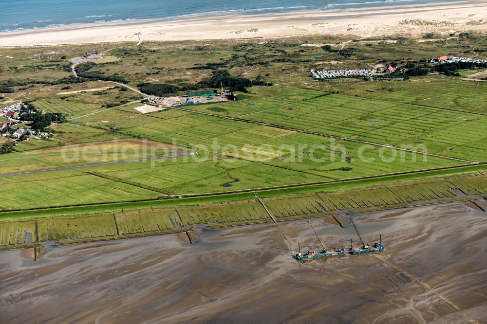 Hagermarsch from the bird's eye view: Ship - Special ship for laying grid connection systems for offshore wind turbines Balwin1 and Balwin2 in Hagermarsch in the state Lower Saxony, Germany