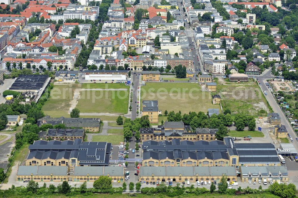 Magdeburg from above - Blick auf das Areal des alten Schlachthofes. Der ehemalige Schlachthof ist heute ein durch Gewerbeansiedlungen geprägtes Gebiet mit einer Mischnutzung aus Wohn- und Gewerbeflächen. Einige der Gebäude stehen unter Denkmalschutz. View of the site of the old slaughterhouse. The former slaughterhouse today is a coined by industry to move to area with a mixed use residential and commercial space.