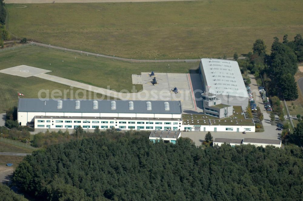 Ahrensfelde from above - Blick auf das Areal der Bundespolizei-Fliegerstaffel Blumberg an der Neuer Schwanebecker Weg 3 in 16356 Ahrensfelde. Auf dem Gelände des Helikopterlandeplatzes am Berliner Stadtrand sind auch Maschinen der Regierungsfliegerstaffel stationiert. Am Standort erfolgt in den neu errichteten Hangars auch die Wartung und Reparatur der Flugtechnik.