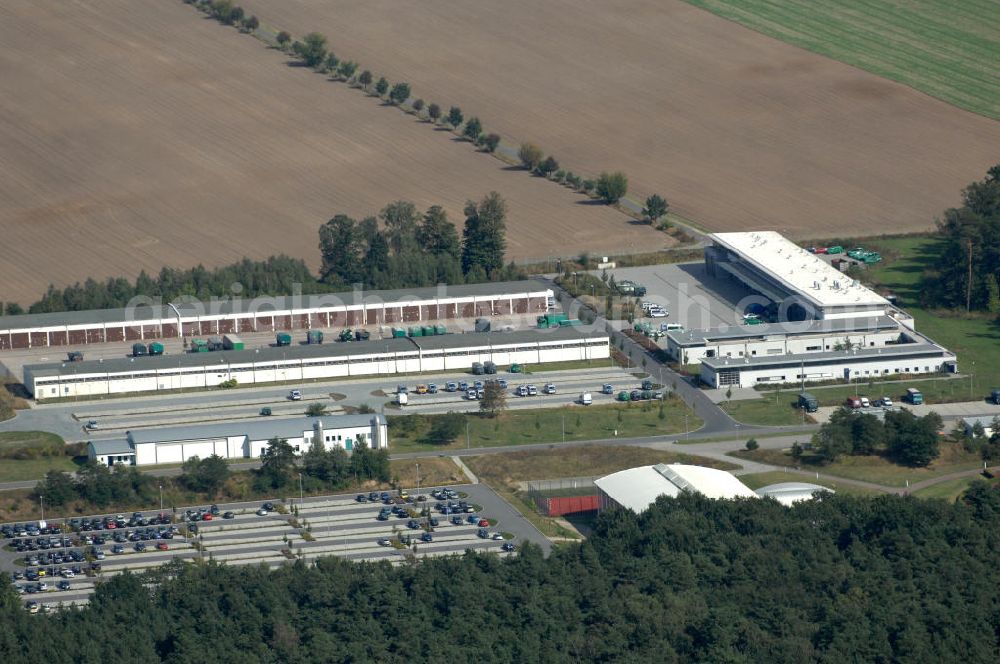 Ahrensfelde from the bird's eye view: Blick auf das Areal der Bundespolizei-Fliegerstaffel Blumberg an der Neuer Schwanebecker Weg 3 in 16356 Ahrensfelde. Auf dem Gelände des Helikopterlandeplatzes am Berliner Stadtrand sind auch Maschinen der Regierungsfliegerstaffel stationiert. Am Standort erfolgt in den neu errichteten Hangars auch die Wartung und Reparatur der Flugtechnik.