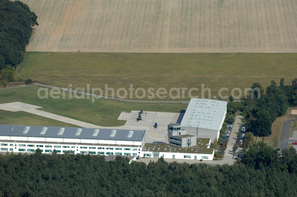 Ahrensfelde from above - Blick auf das Areal der Bundespolizei-Fliegerstaffel Blumberg an der Neuer Schwanebecker Weg 3 in 16356 Ahrensfelde. Auf dem Gelände des Helikopterlandeplatzes am Berliner Stadtrand sind auch Maschinen der Regierungsfliegerstaffel stationiert. Am Standort erfolgt in den neu errichteten Hangars auch die Wartung und Reparatur der Flugtechnik.