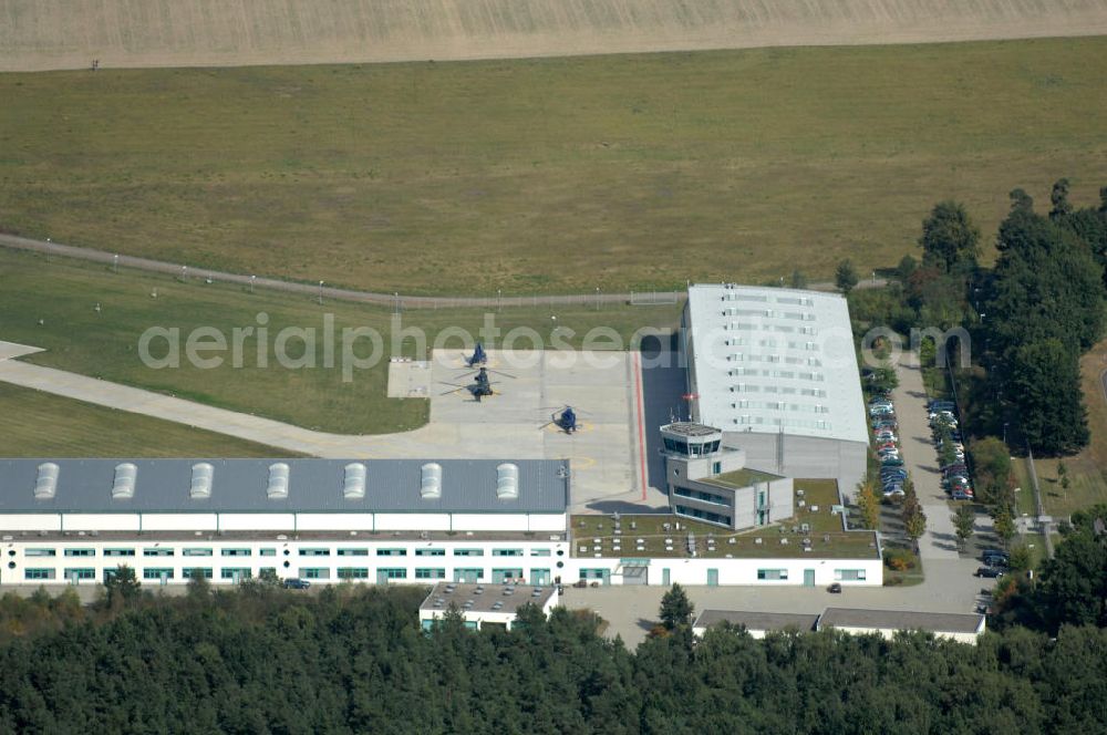 Ahrensfelde from the bird's eye view: Blick auf das Areal der Bundespolizei-Fliegerstaffel Blumberg an der Neuer Schwanebecker Weg 3 in 16356 Ahrensfelde. Auf dem Gelände des Helikopterlandeplatzes am Berliner Stadtrand sind auch Maschinen der Regierungsfliegerstaffel stationiert. Am Standort erfolgt in den neu errichteten Hangars auch die Wartung und Reparatur der Flugtechnik.