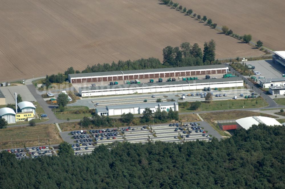 Aerial image Ahrensfelde - Blick auf das Areal der Bundespolizei-Fliegerstaffel Blumberg an der Neuer Schwanebecker Weg 3 in 16356 Ahrensfelde. Auf dem Gelände des Helikopterlandeplatzes am Berliner Stadtrand sind auch Maschinen der Regierungsfliegerstaffel stationiert. Am Standort erfolgt in den neu errichteten Hangars auch die Wartung und Reparatur der Flugtechnik.